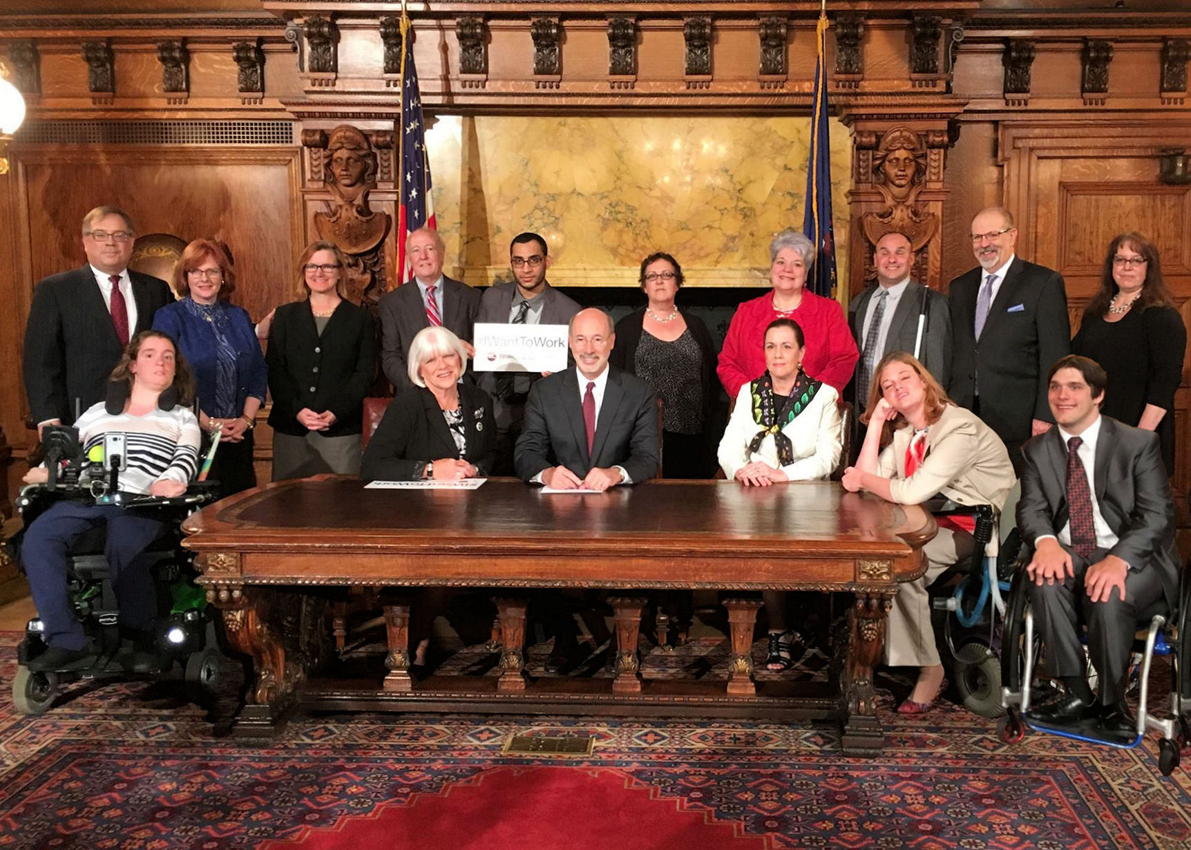 Josie Badger sits with cohorts of the #IWantToWork campaign.