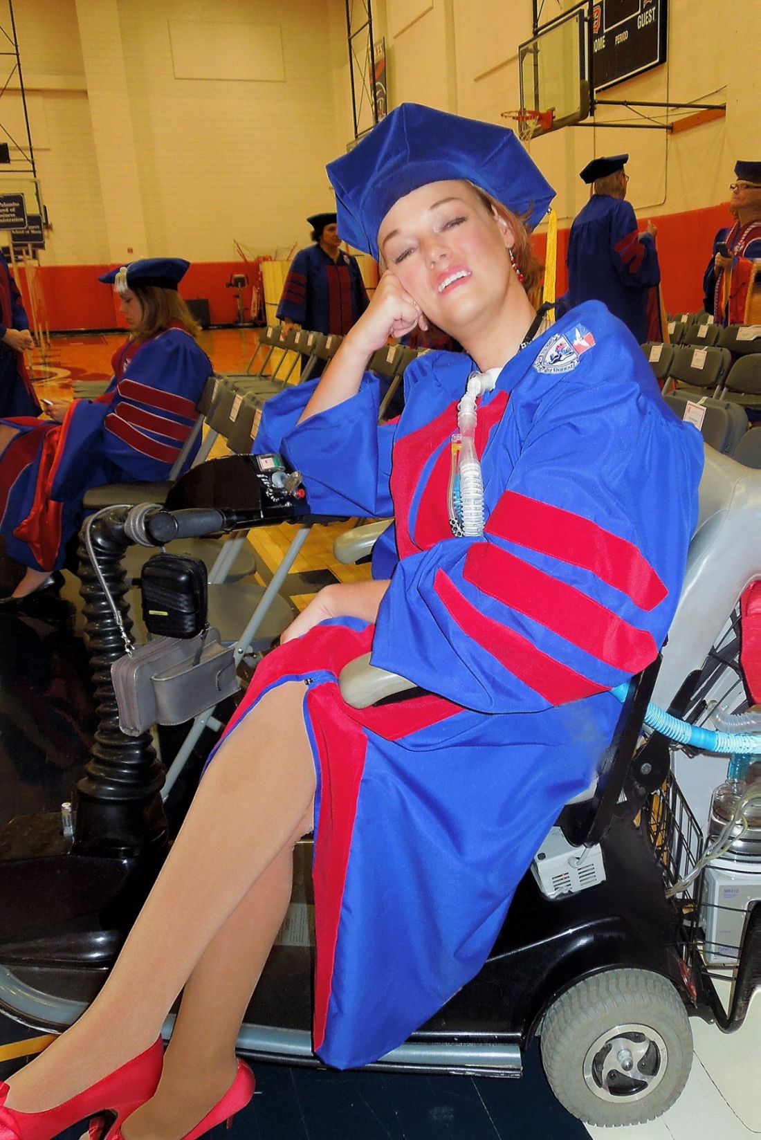 Josie Badger in graduation cap and gown.